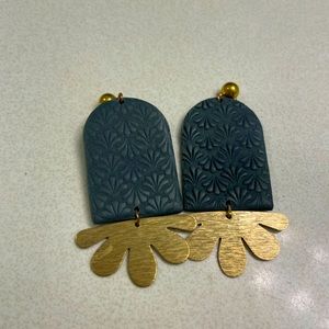 Emerald green patterned earrings with gold accents